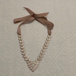 Necklace with ribbon tie